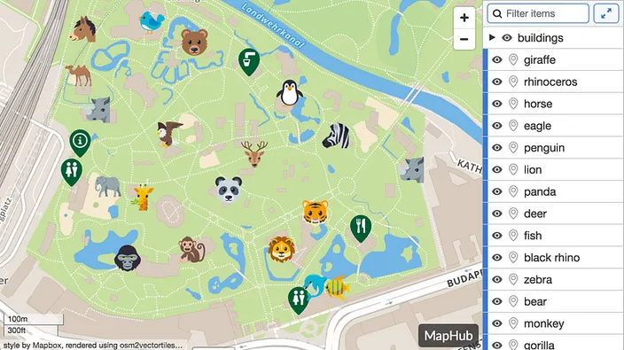 An embedded MapHub map featuring a zoo or park layout with animal icons, demonstrating the interactive item sidebar panel displaying a list of filtered items like giraffe, panda, and eagle.